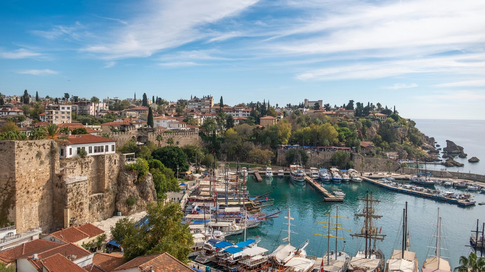 Antalya old harbour with yachts and historic walls