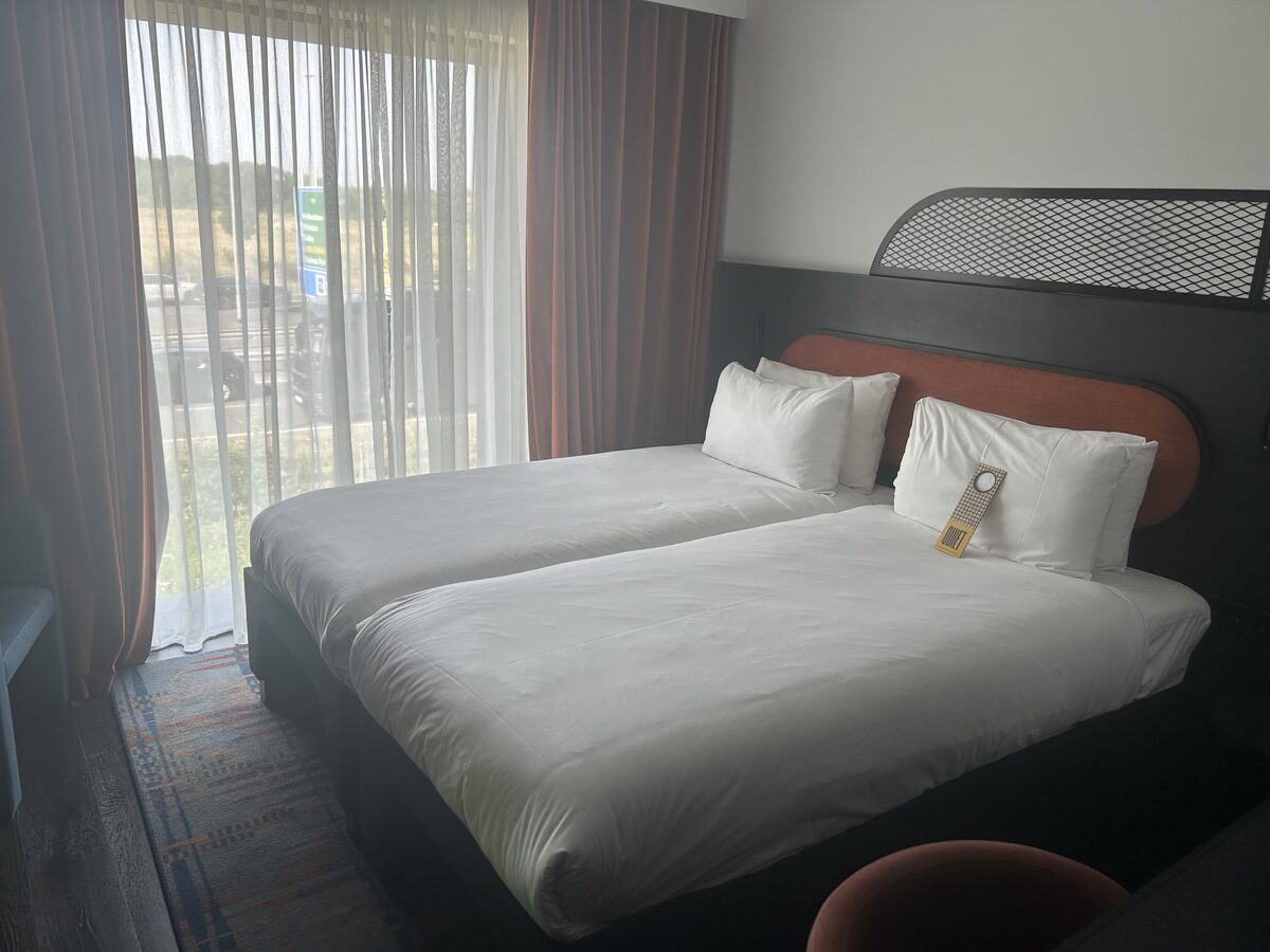 Tribe Hotel Manchester Airport twin room with comfortable beds and floor-to-ceiling windows