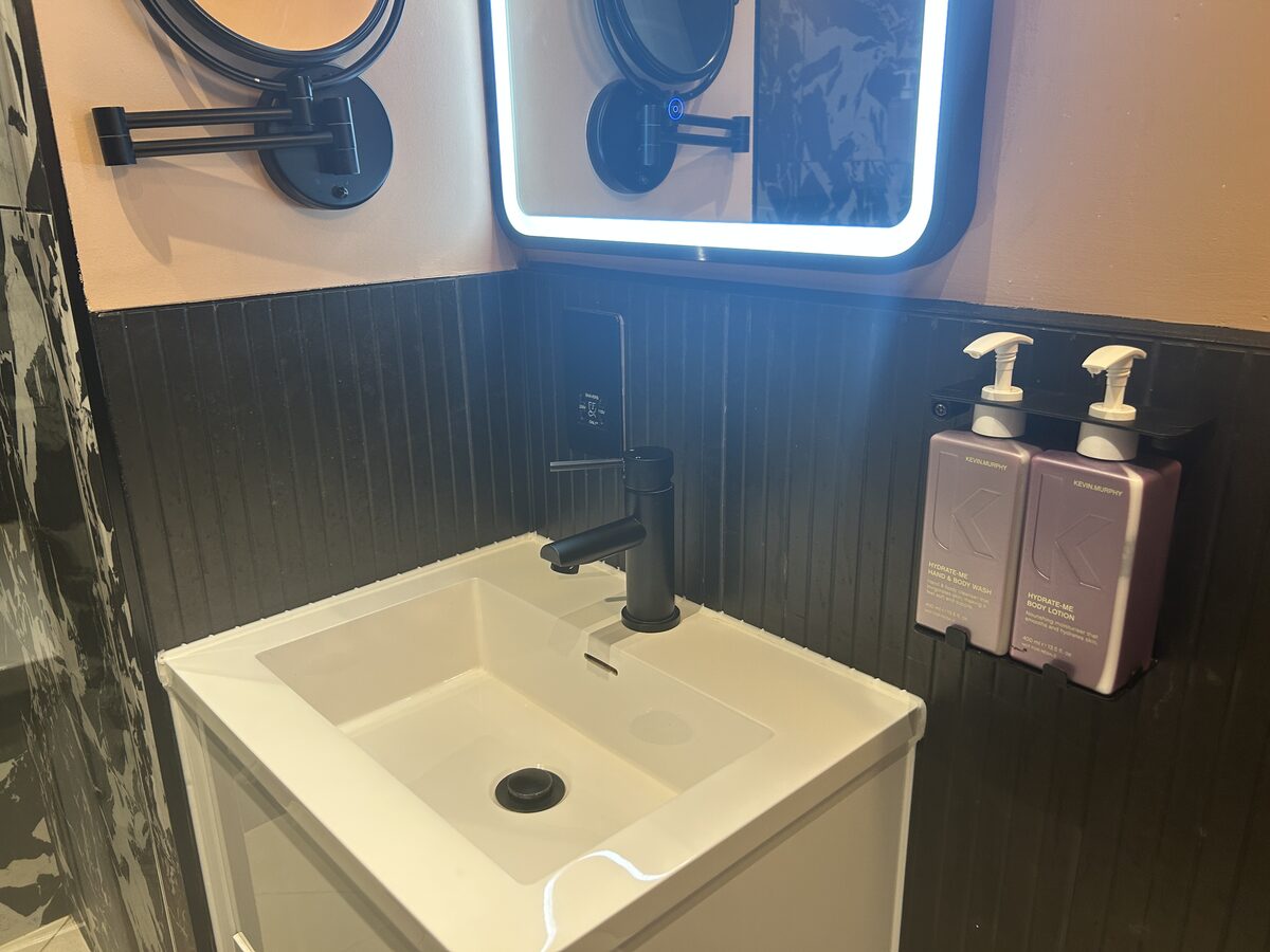 Tribe Hotel bathroom sink with Kevin Murphy toiletries