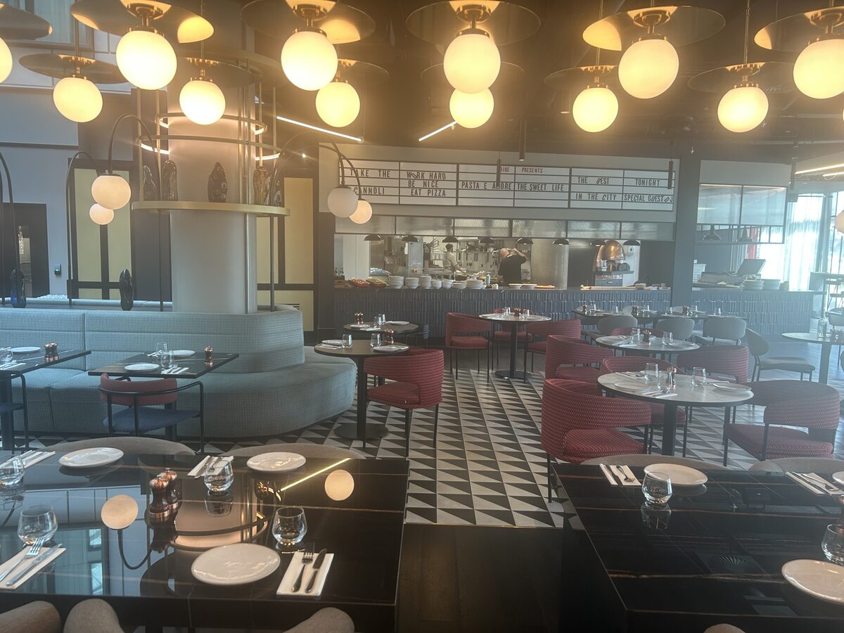 Tribe Table restaurant dining area with open kitchen