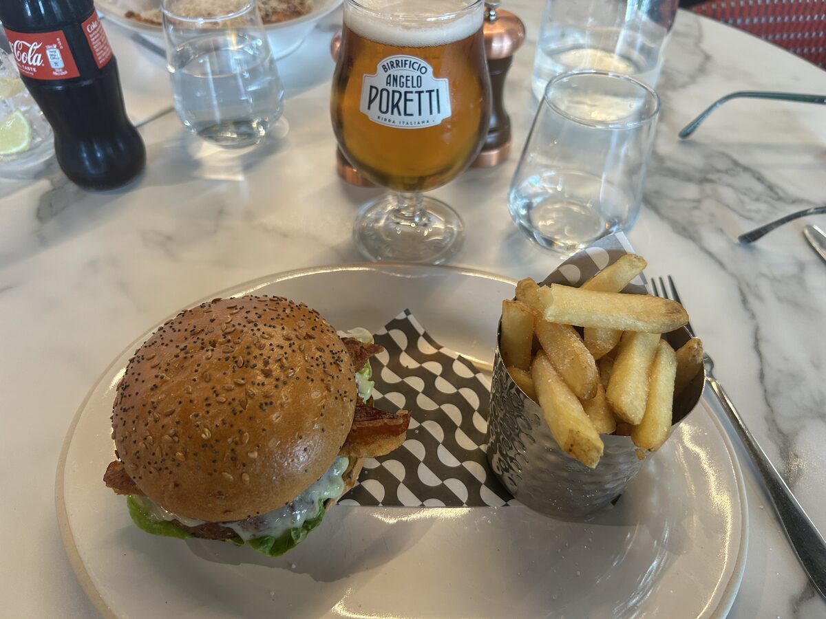 Tribe Cheeseburger with fries and an ice cold Birrificio Angelo Poretti